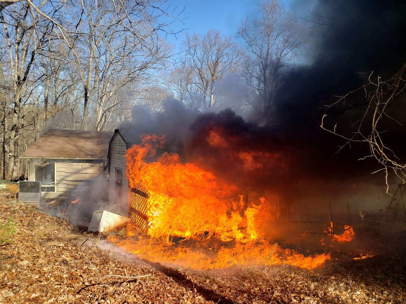 Mobile home, storage shed engulfed in heavy fire in Bedford County