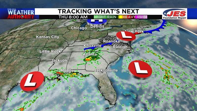 Two tropical lows and a front bring scattered downpours this week