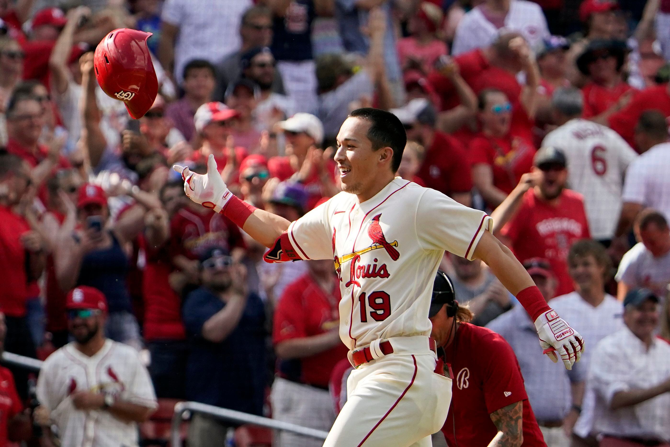 Cincinnati Reds' Stuart Fairchild (17) celebrates with first base