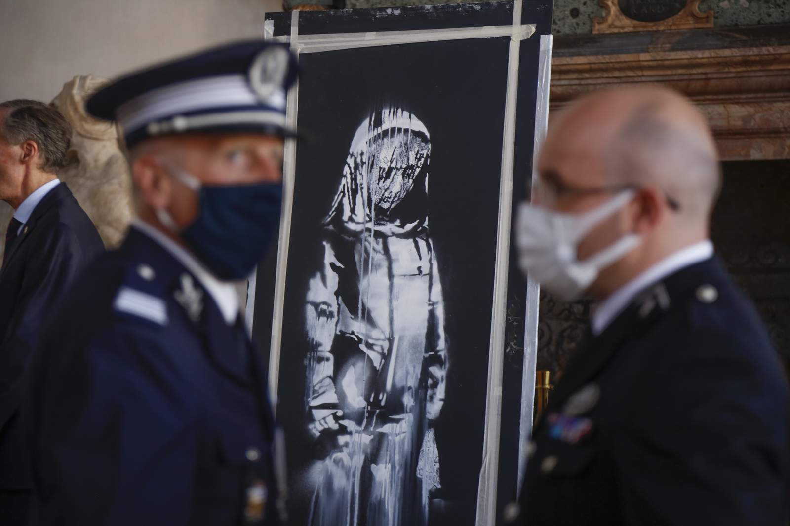 Italy returns stolen Banksy to France on Bastille Day