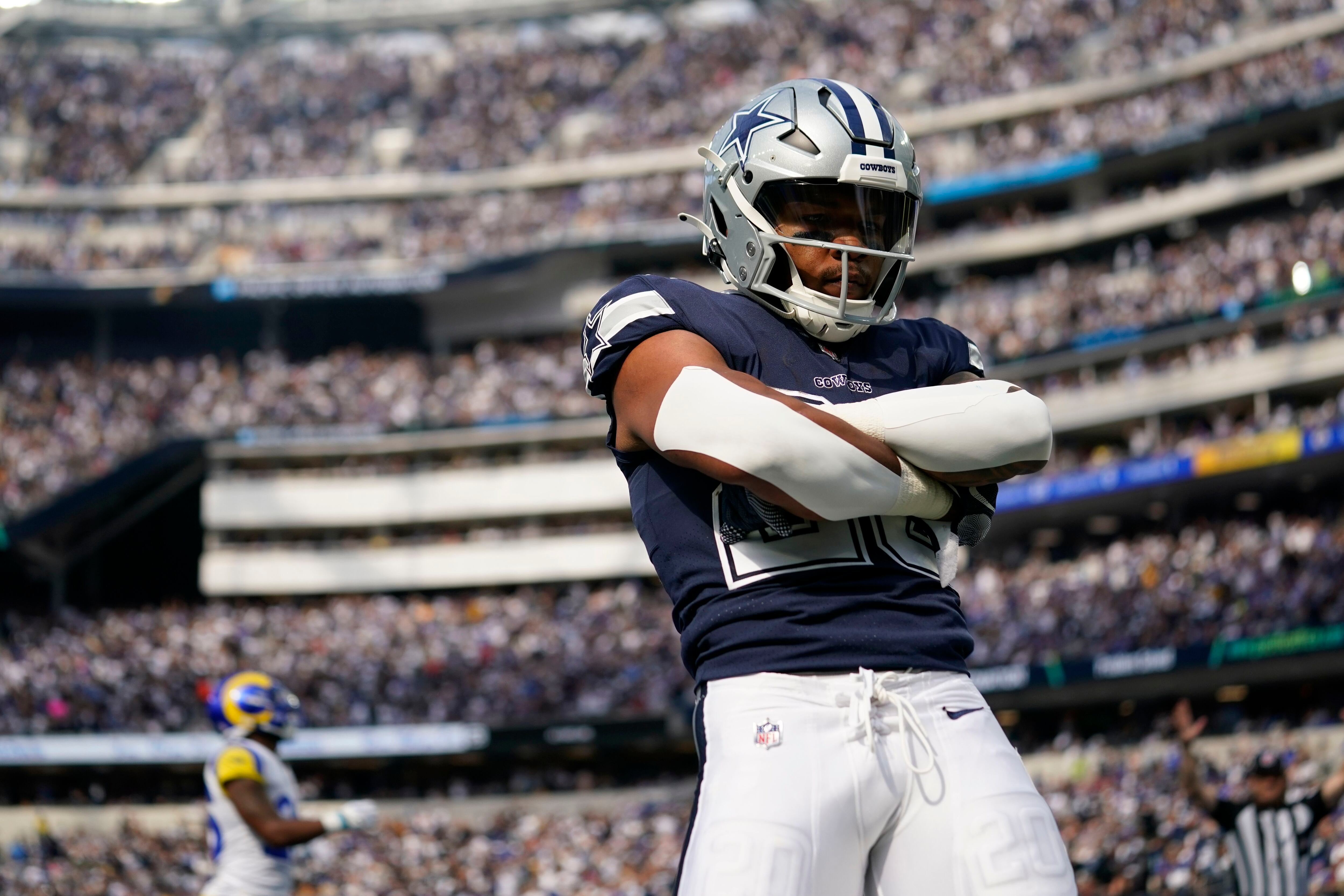 Dominant D puts Cowboys past Rams 22-10 for 4th straight win