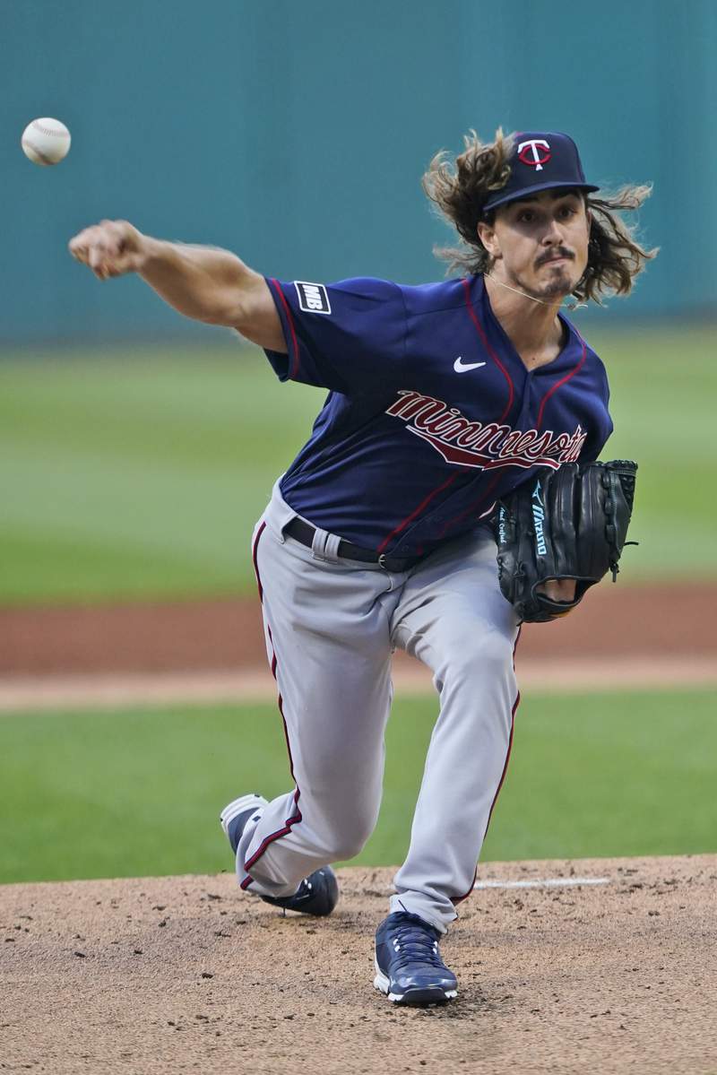 Rip-off: Indians pitcher Plesac breaks thumb removing shirt