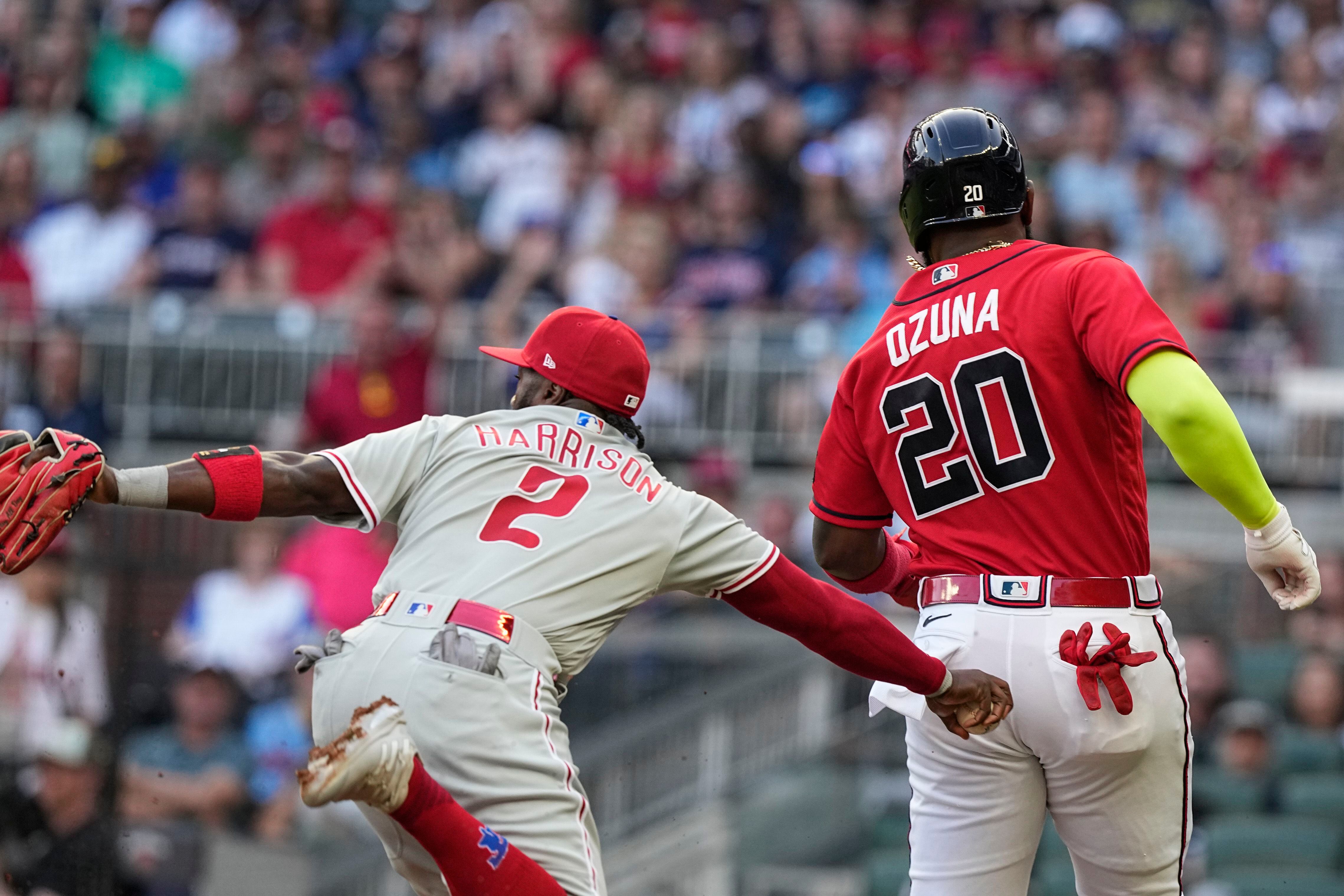 Marcell Ozuna celebrates milestone with teammates . and