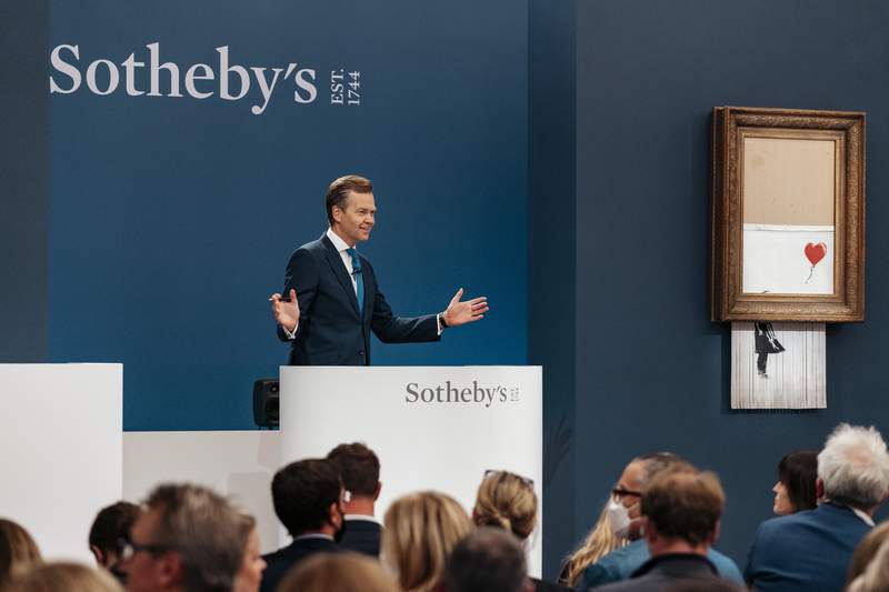 Shredded Banksy artwork sells for $25.4 million at auction