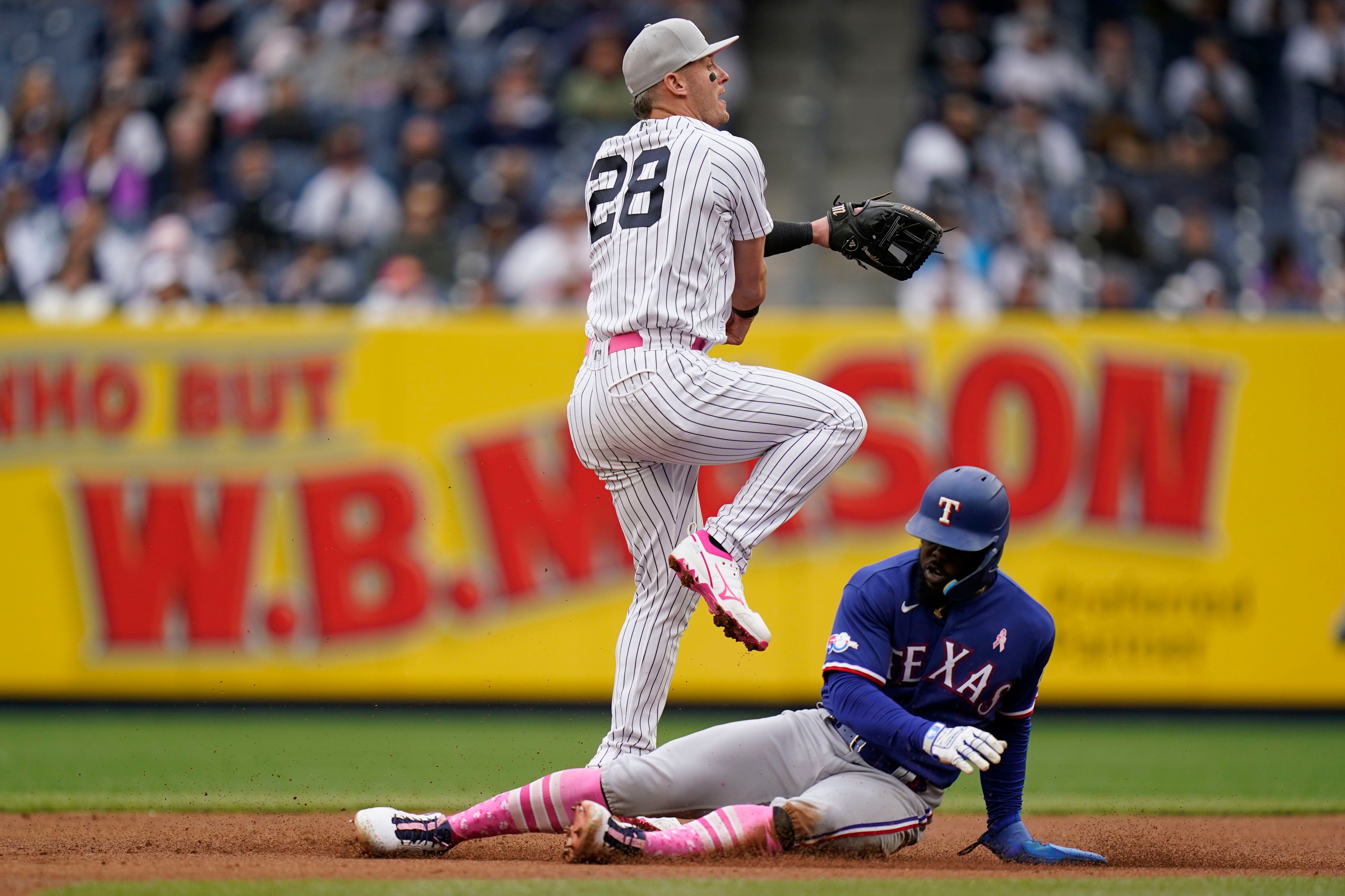 Marinaccio, Holmes escape trouble, Yankees beat Rangers 1-0 on