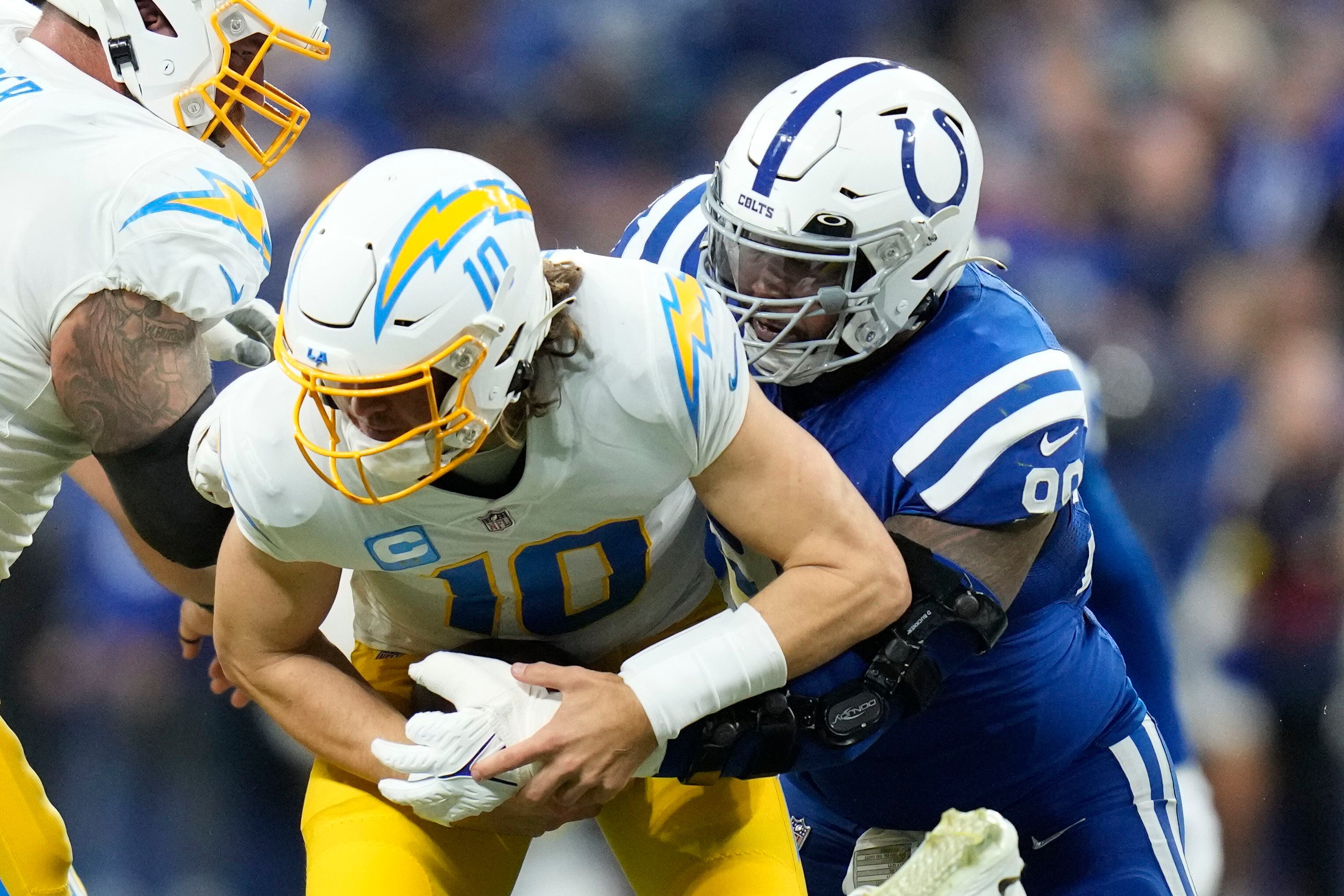 Justin Herbert and Chargers defeat Colts, clinch playoff spot