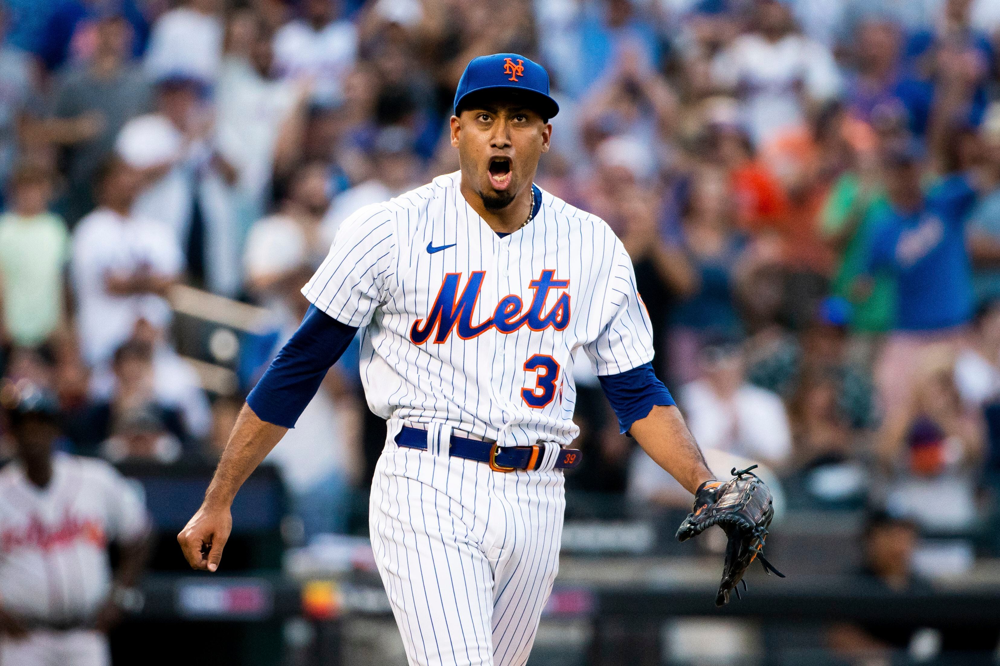 Dominant deGrom pitches surging Mets to 5-2 win over Braves