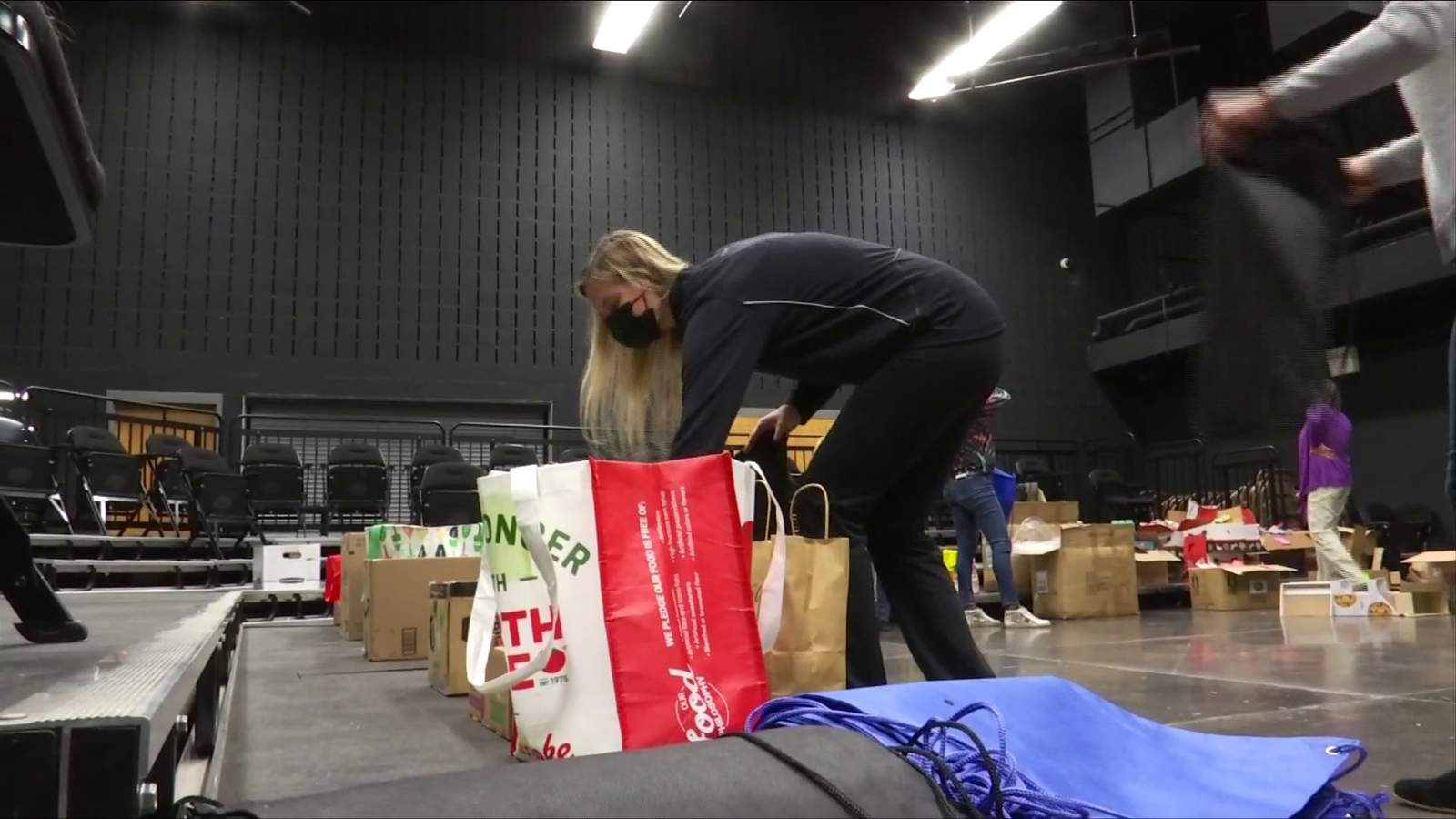Patrick Henry High School teachers, parents pack winter care packages for homeless students