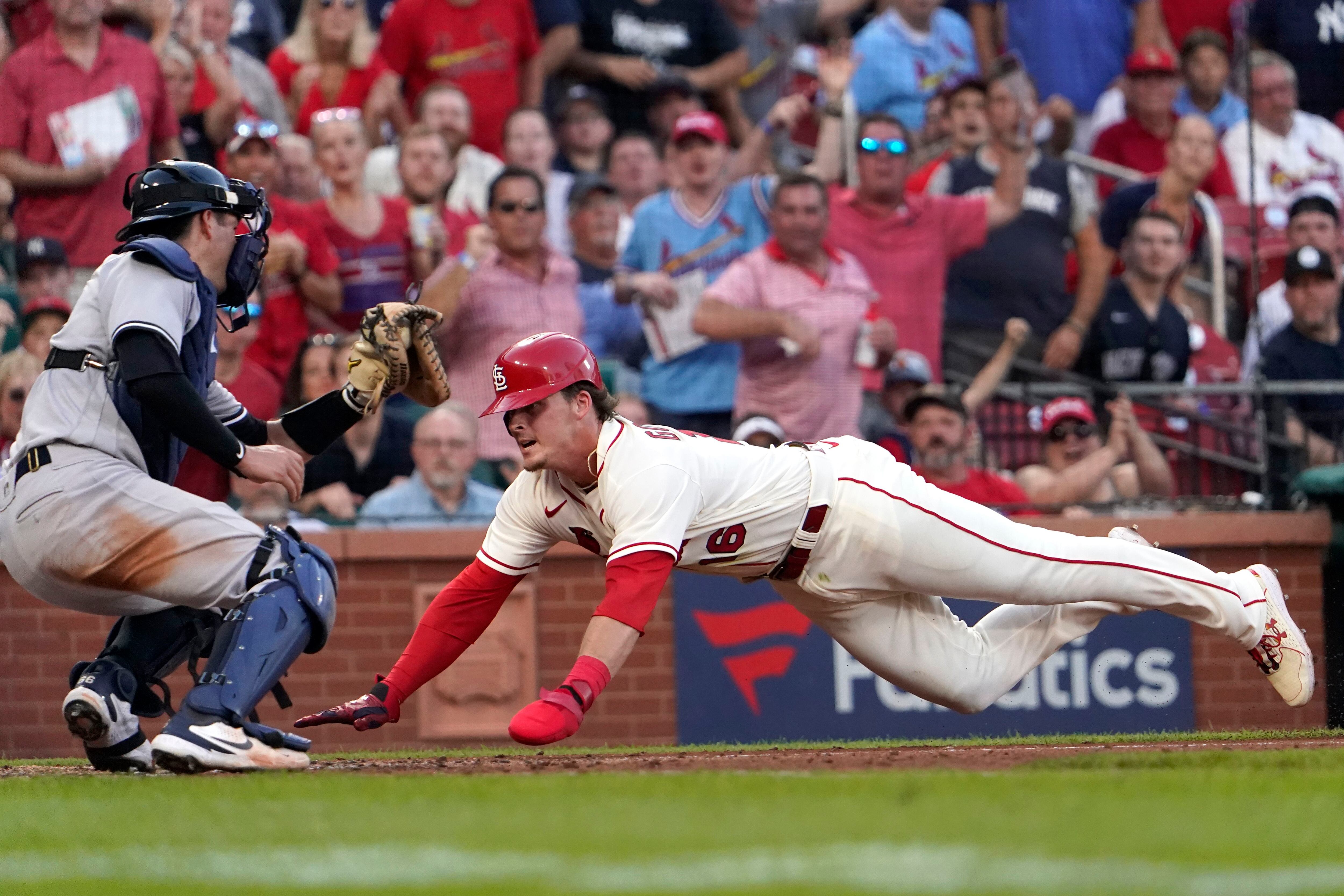 St. Louis Cardinals pitcher Jack Flaherty hugs mother after win