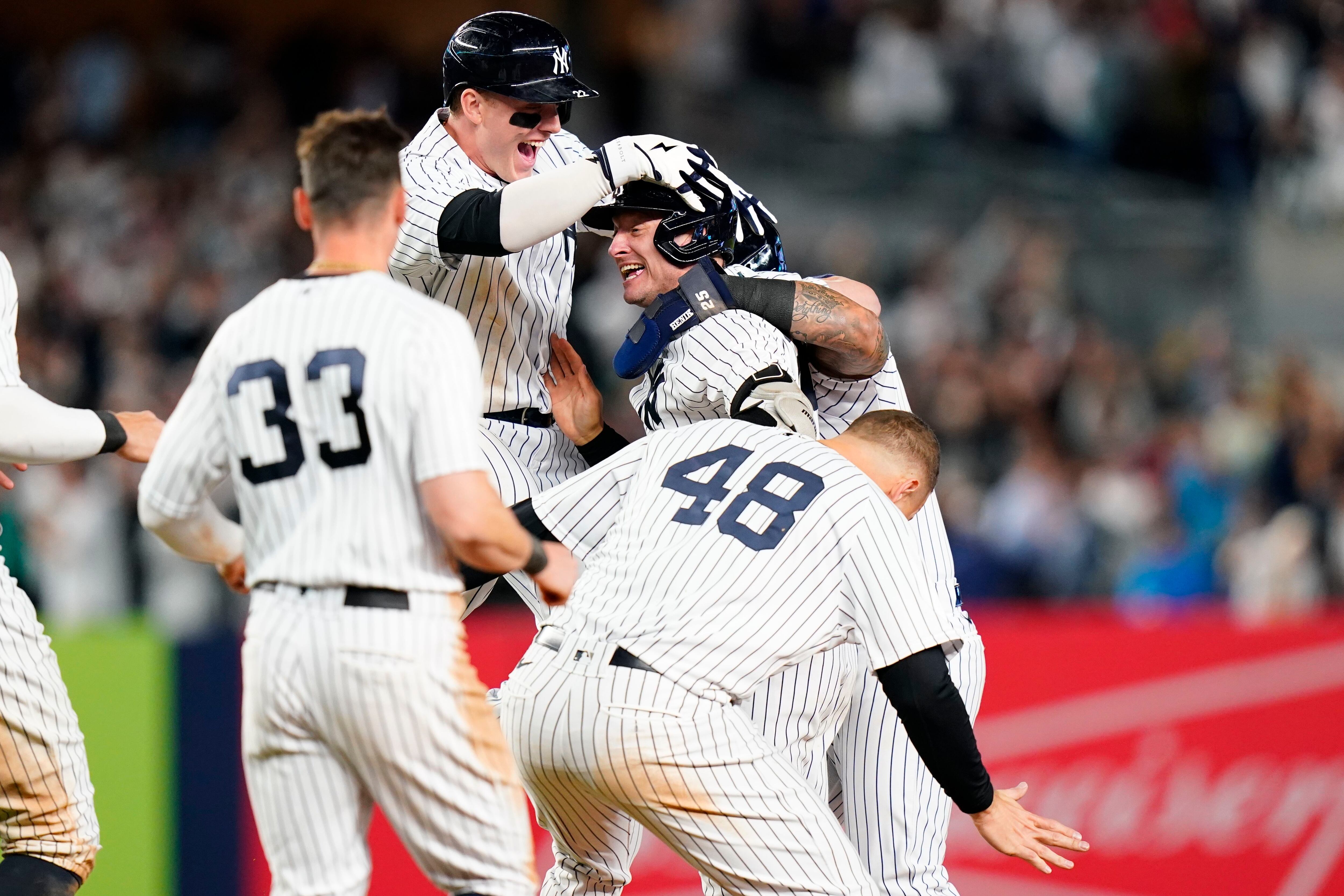 Aaron Judge falls just short of 61, Yankees clinch playoff berth in win  over Red Sox