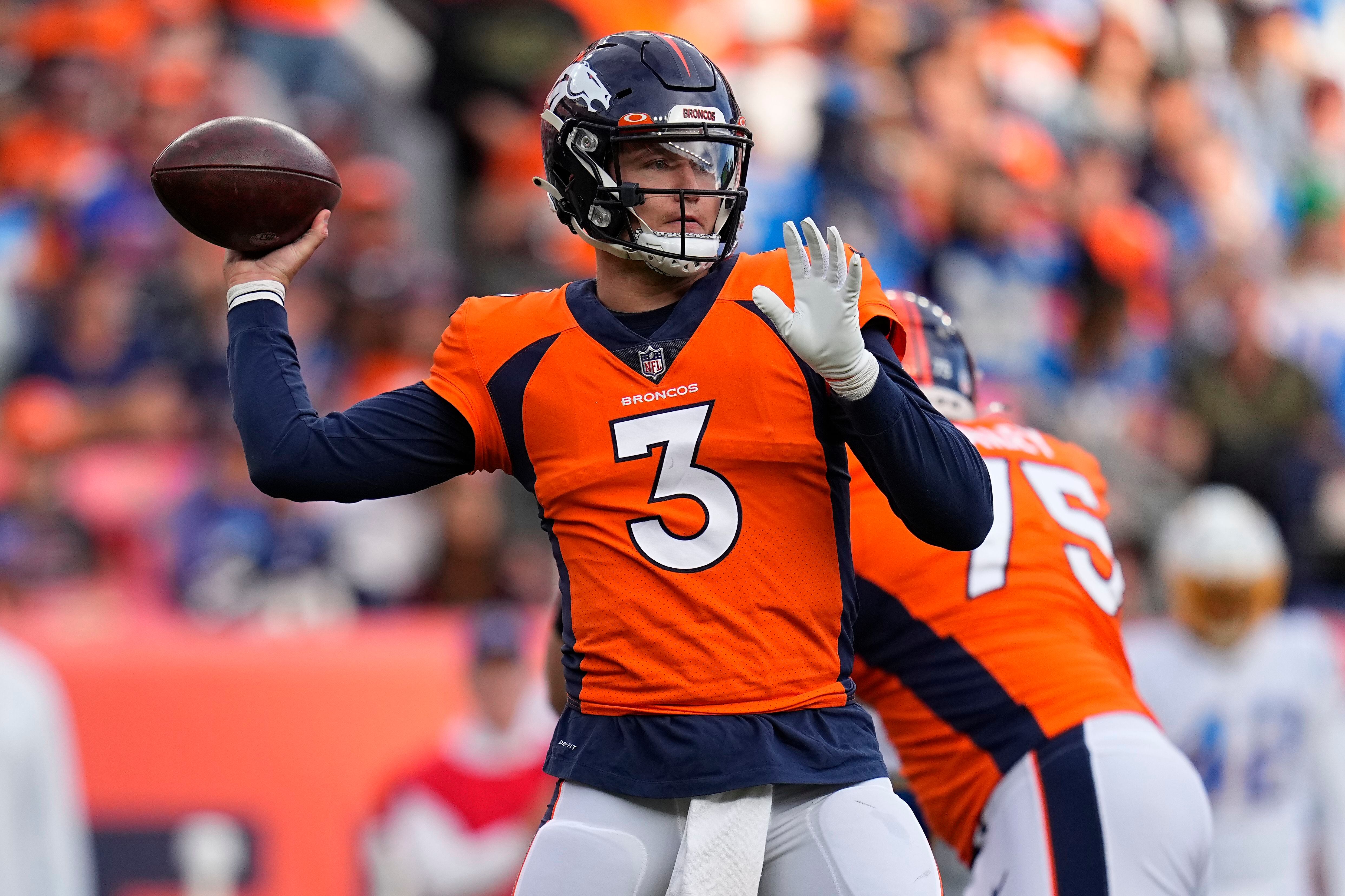 Interceptions lead to Chargers' 28-13 loss to Broncos