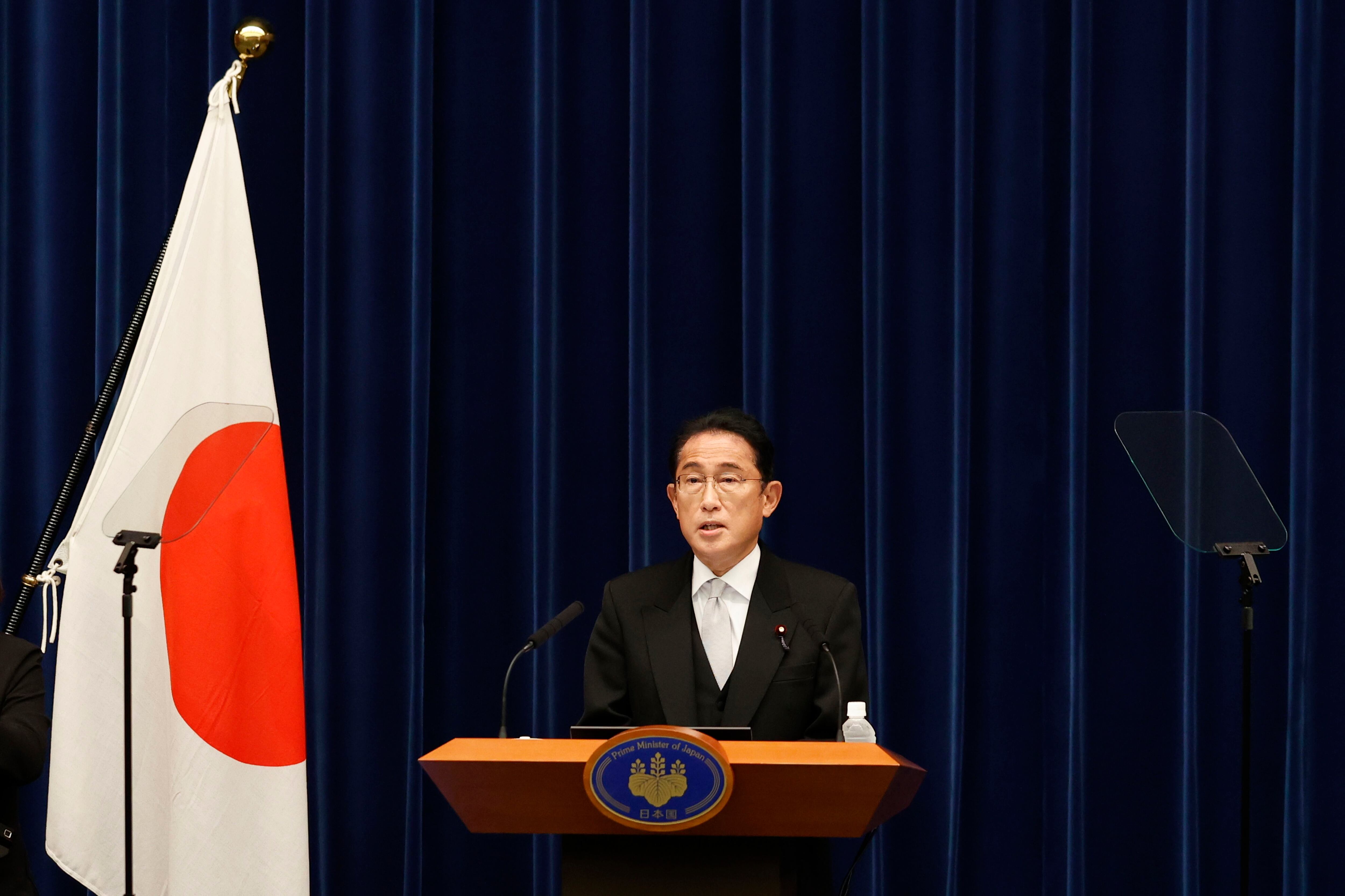 Japan PM purges Cabinet after support falls over church ties