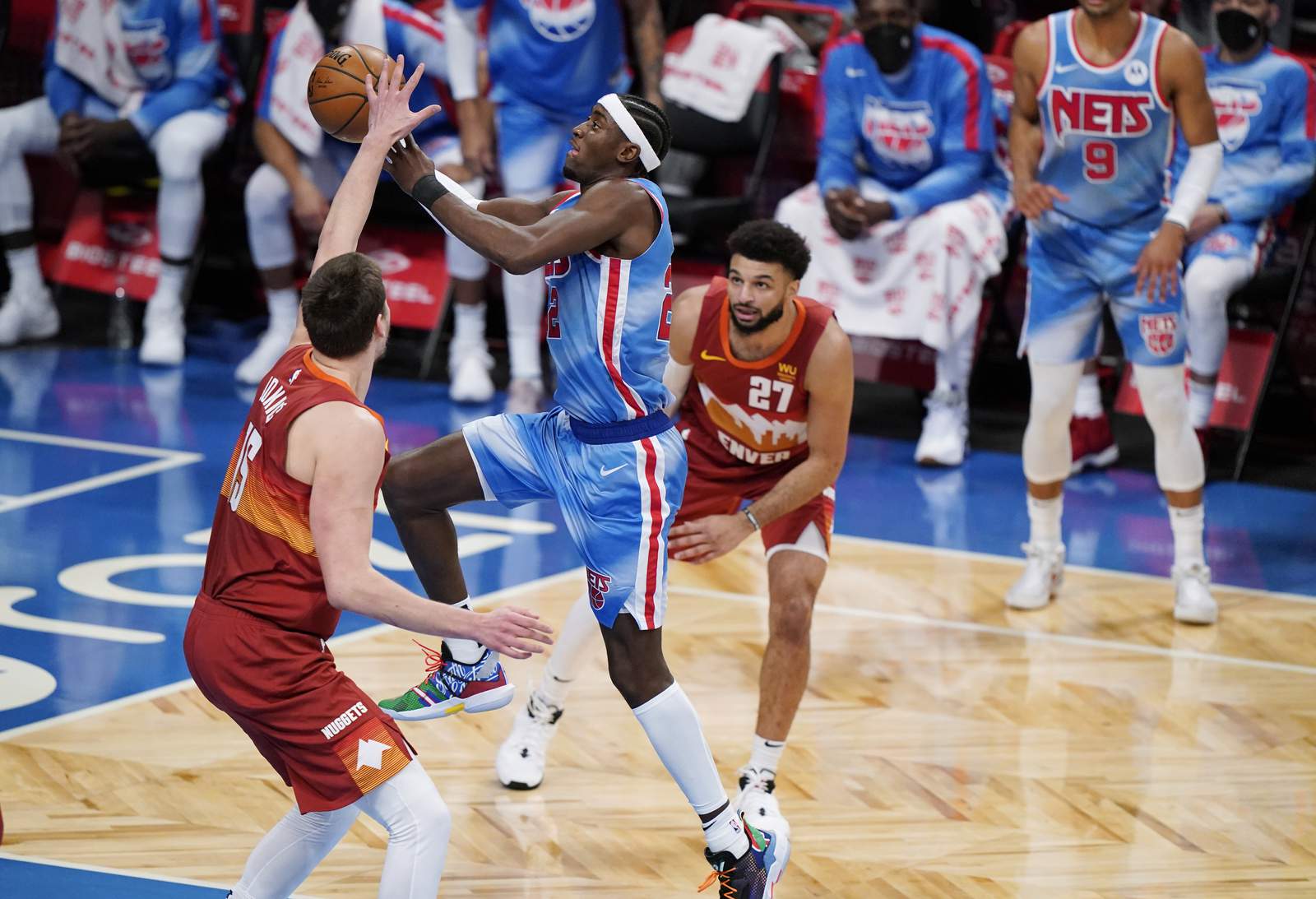 Millsap helps Nuggets rally, stun Clippers 111-105 in Game 5