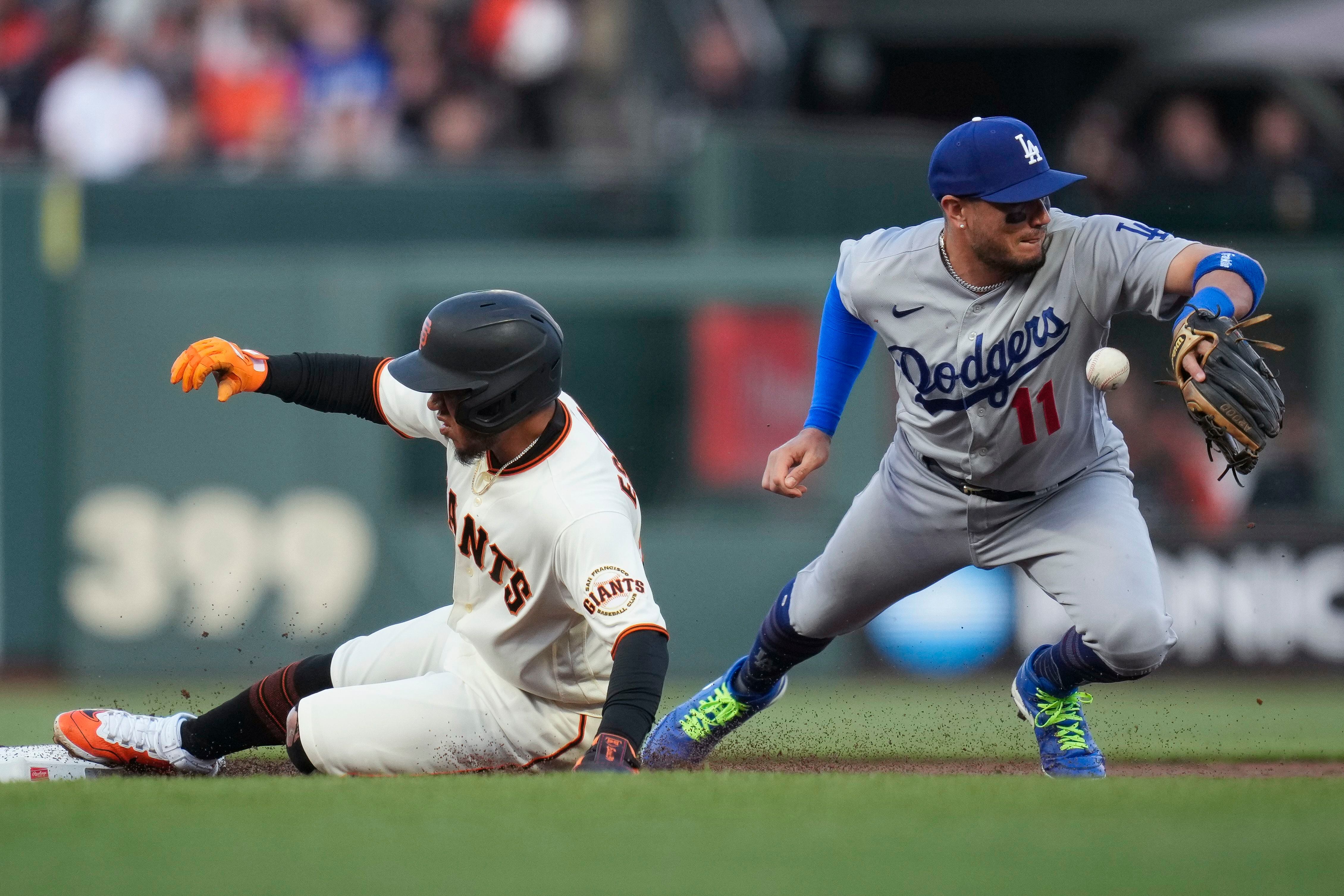 Why is Mookie Betts playing shortstop? Dodgers injuries, past infield  experience lead to star's new position