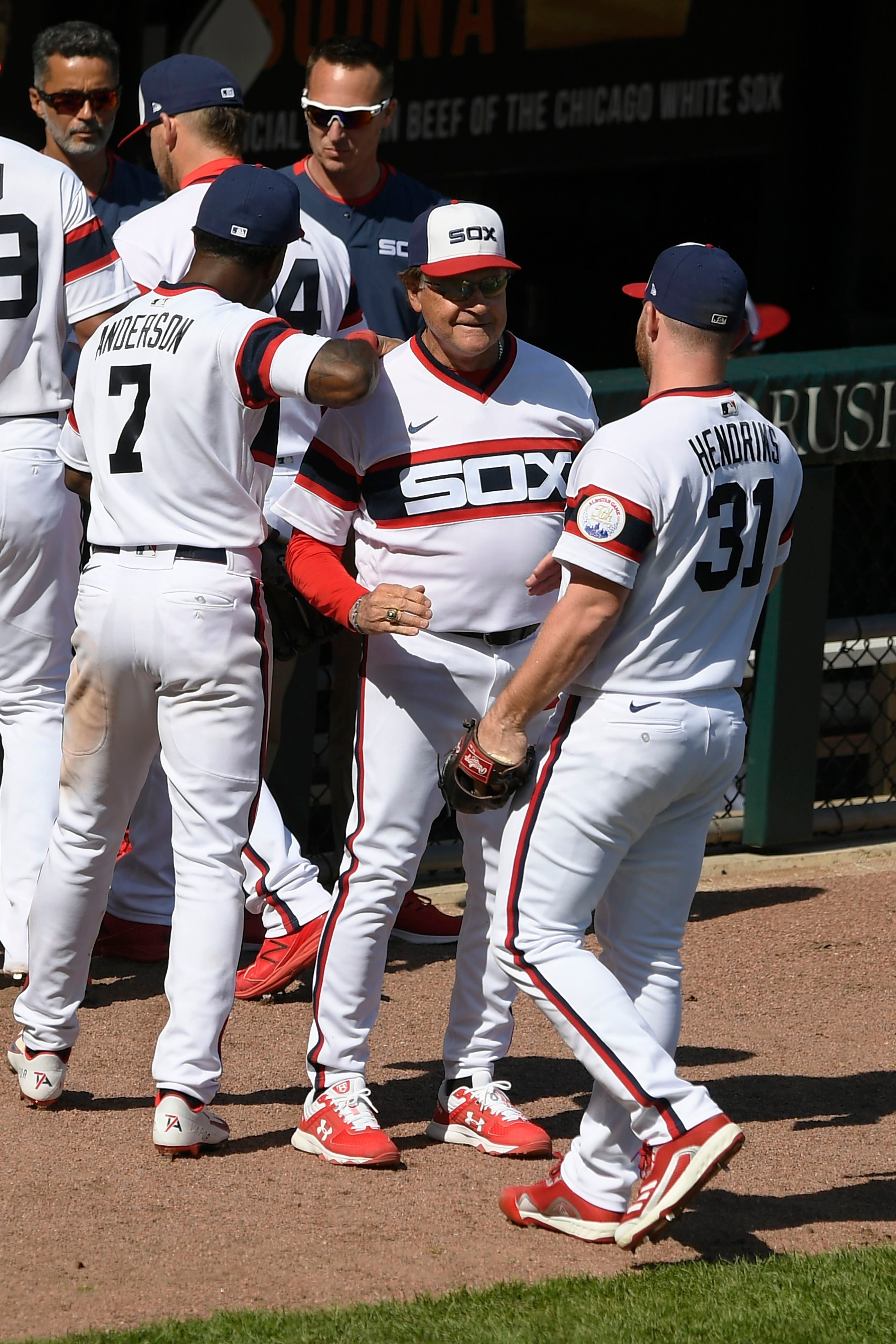 Chicago White Sox's Billy Hamilton (0) and Tim Anderson (7