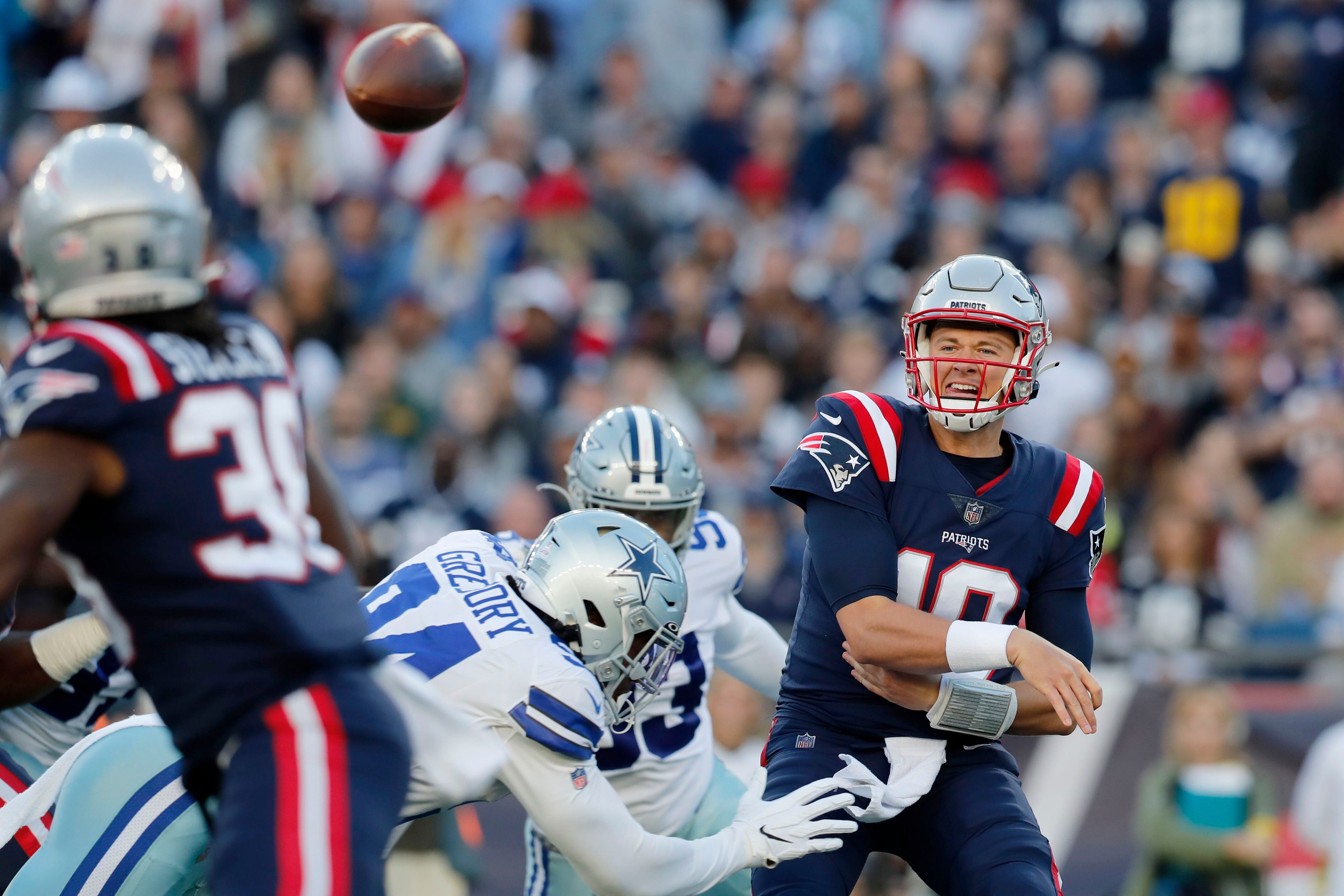 Cowboys pull out OT victory, 35-29, over Patriots for 5th straight win