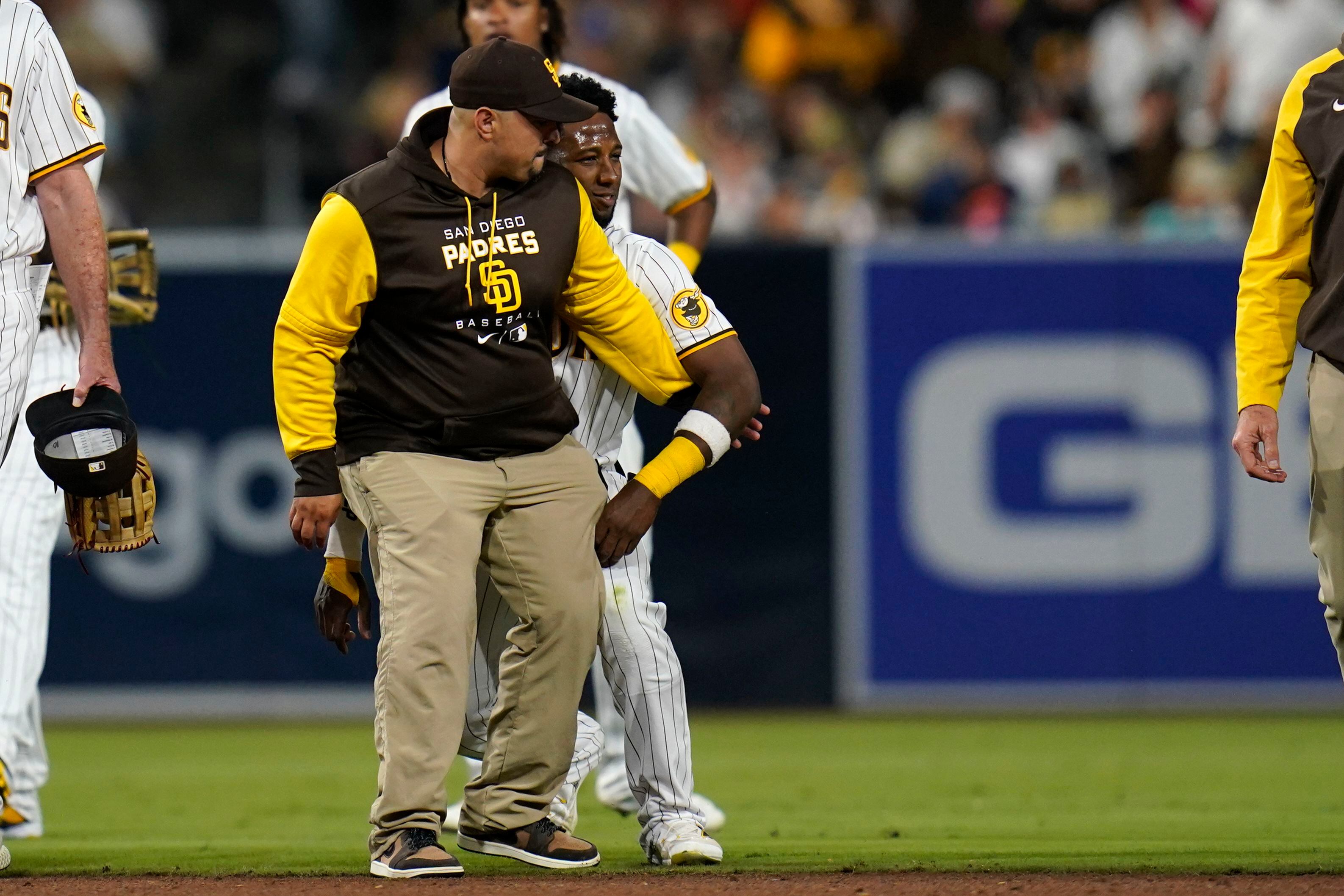 Padres' Jurickson Profar collapses after scary outfield collision with C.J.  Abrams, carted off field - ESPN