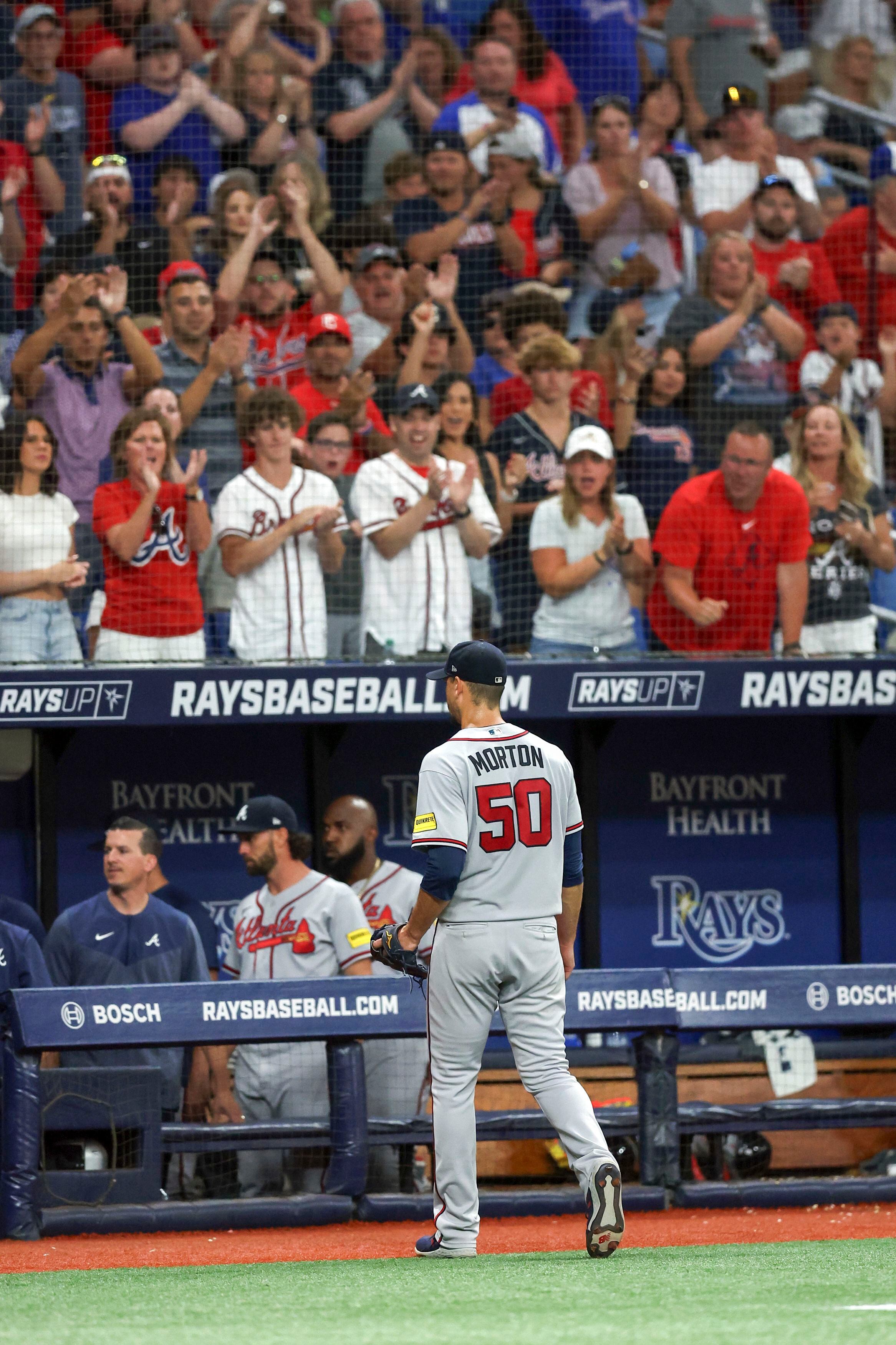 Atlanta Braves starting pitcher Charlie Morton wipes his face