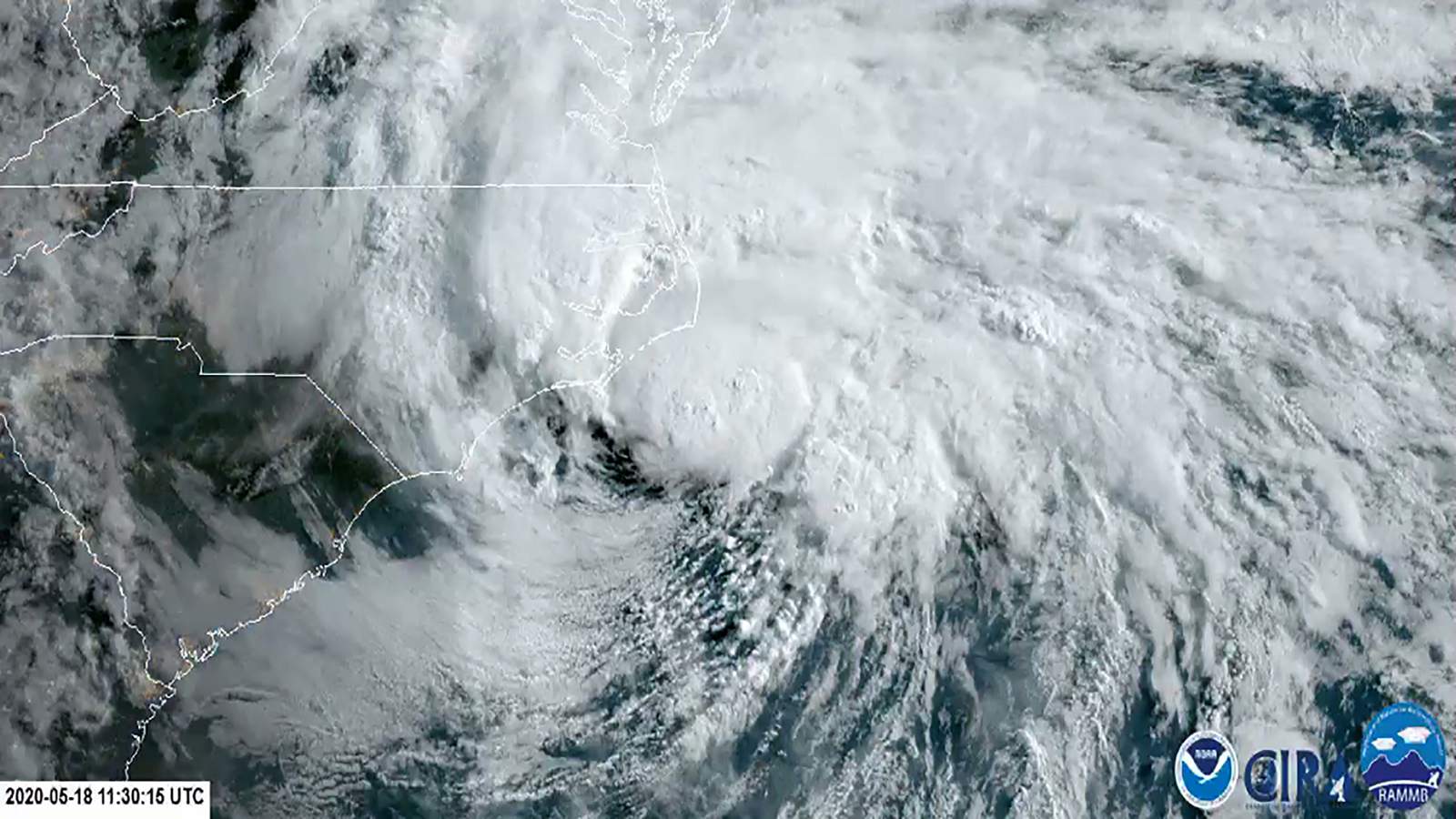 Tropical Storm Arthur spins out to sea, will drench Bermuda