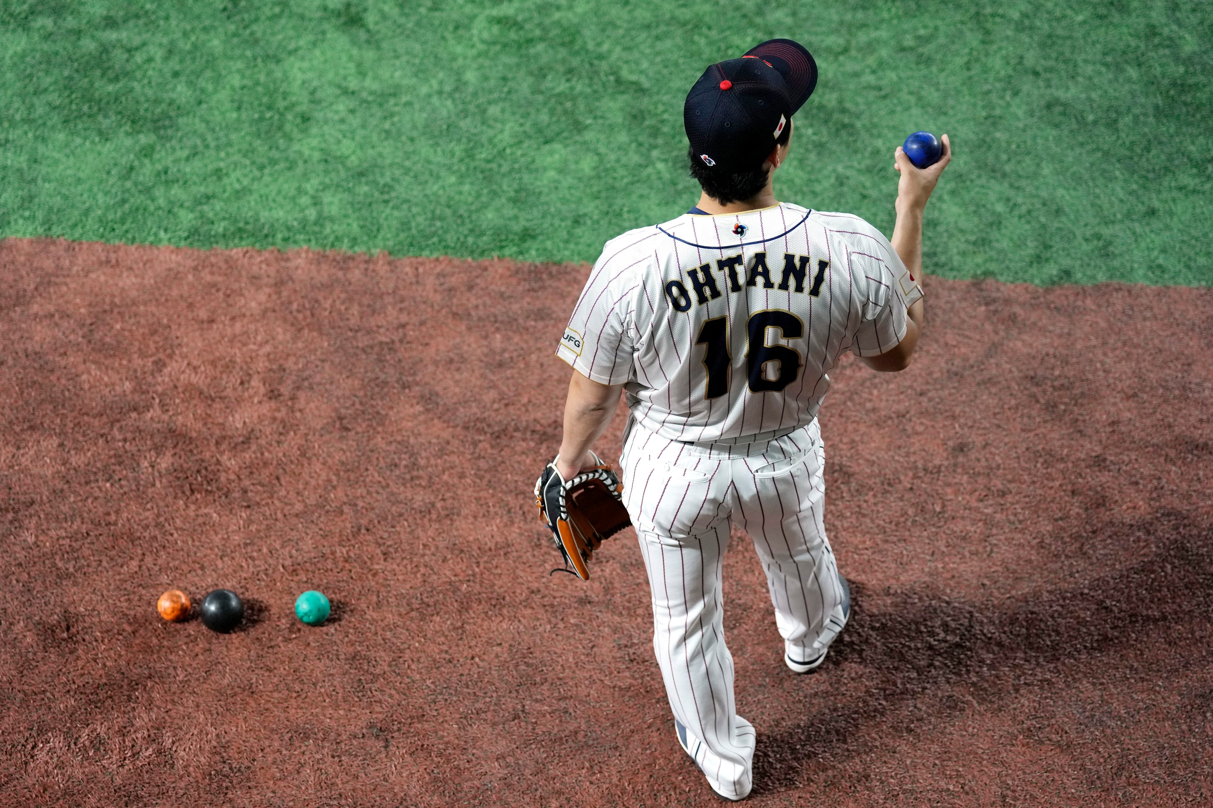 Lars Nootbaar shines spotlight on Shohei Ohtani after two-way superstar  seals historic third championship for Team Japan at 2023 WBC