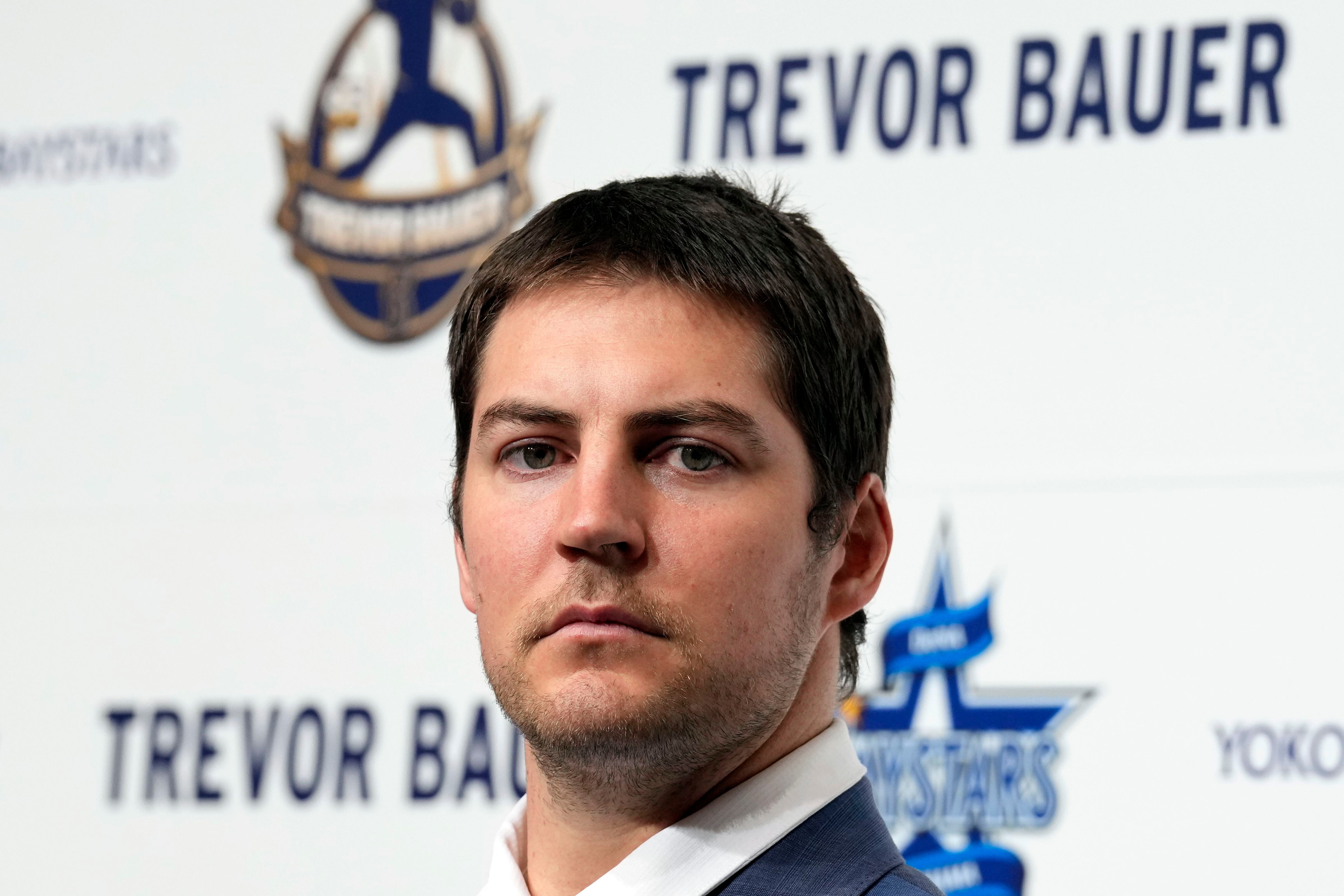 Trevor Bauer, shunned by MLB, introduced by Japanese team